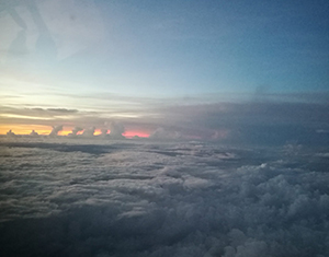 View of the sunset through an airplane window
