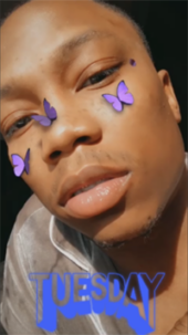 A self-portrait with butterflies